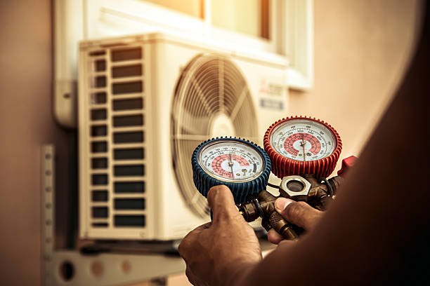 Professional Air Conditioning Service technician working in High Shoals, NC